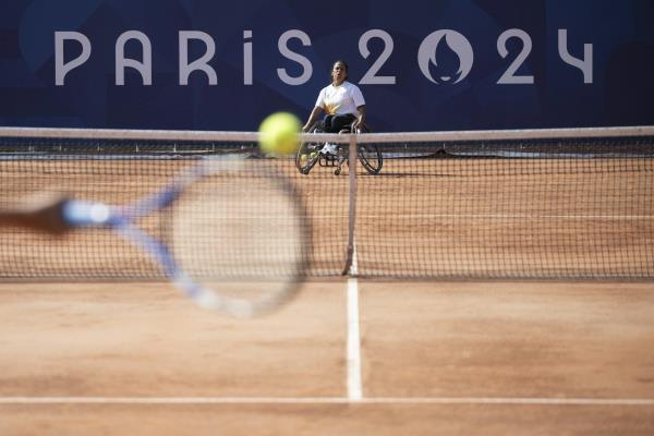 A wheelchair tennis player practises ahead of the Paris Paralympics